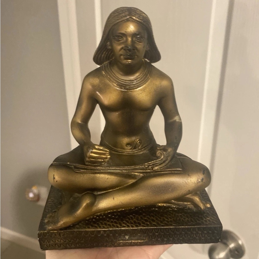 Gold Seated Figure Sculpture